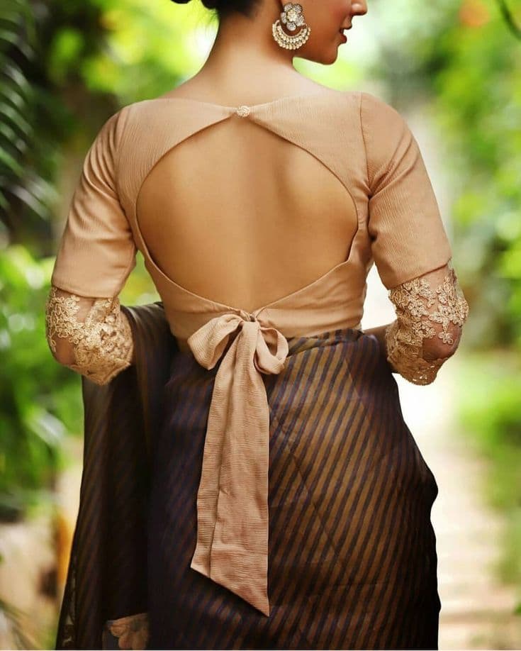 Knotted back blouse